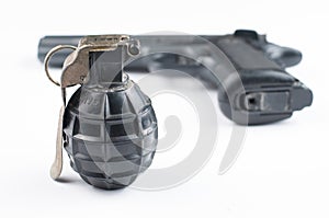 Gun and bomb  on white background.Pistol isolated
