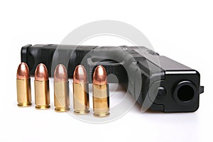 Gun and bullets photo