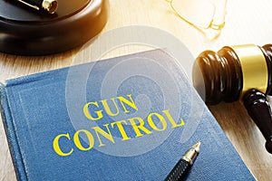 Gun control law and gavel.