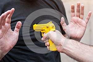 Gun Disarm. Self defense techniques against a gun point.