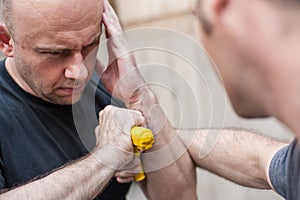 Gun Disarm. Self defense techniques against a gun point.