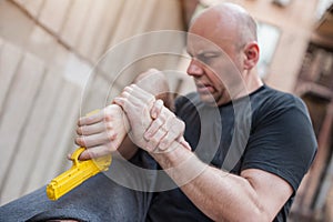 Gun Disarm. Self defense techniques against a gun point.