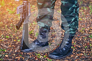 Gun on foot Army, Military Boots lines of commando soldiers in camouflage uniforms Thailand