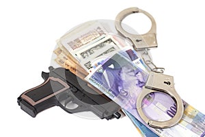 Gun, handcuffs and money