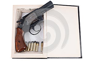 A gun hidden inside a book