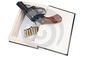 A gun hidden inside a book