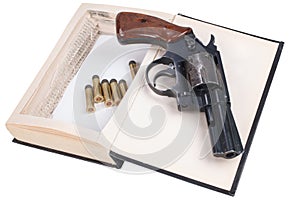 A gun hidden inside a book