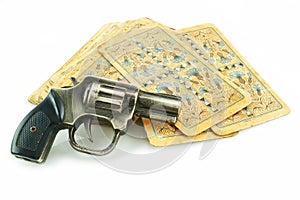 Gun and pack of cards