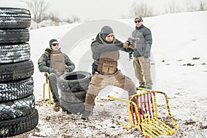 Gun shooting training course with instructor in cafe bar environment