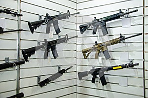 Gun wall rack with rifles