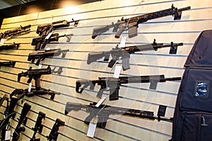 Gun wall rack with rifles