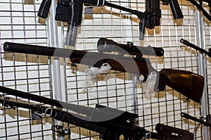 Gun wall rack with rifles