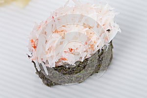 Gunkan stuffed with snow crab meat.