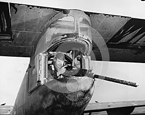 Gunner firing from plane