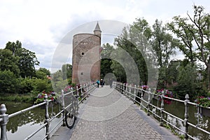 Gunpowder Tower Poertoren with bridge and flowers