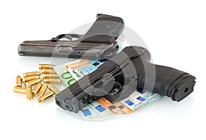 Guns, money, bullets isolated on white background with shadow reflection.