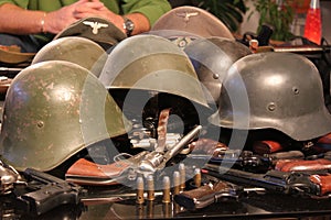 Guns and war helmets