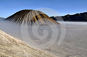 Gunung Bromo valley in fog photo