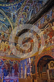 Frescos on interior of Humor Monastery located in Gura Humorului, Romania, is one of the first of Moldova`s painted monasteries