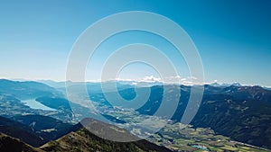 Gurglitzen - Idyllic hiking trail on alpine meadow with scenic view of lake Millstatt seen from mountain peak Boese Nase