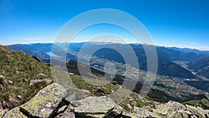 Gurglitzen - Idyllic hiking trail on alpine meadow with scenic view of lake Millstatt seen from mountain peak Boese Nase