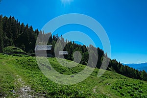 Gurglitzen - Wooden cottage with panoramic view of majestic mountain peaks of Carnic and Julian Alps. Idyllic hiking trail