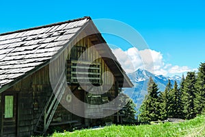 Gurglitzen - Wooden cottage with panoramic view of majestic mountain peaks of Carnic and Julian Alps. Idyllic hiking trail