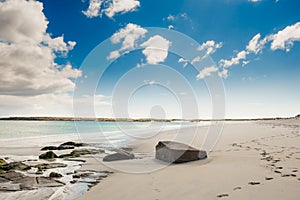 Gurteen bay and beach, near Roundstone town, county Galway, Ireland, warm sunny day, cloudy sky. Beautiful Irish landscape, with