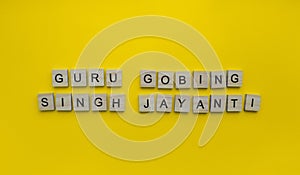 Guru Gobind Singh Jayanti, minimalistic banner with wooden letters