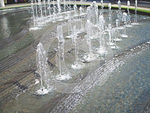 The gush of water from a fountain