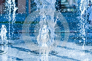 The gush of water of a fountain. Splash of water in the fountain, abstract image