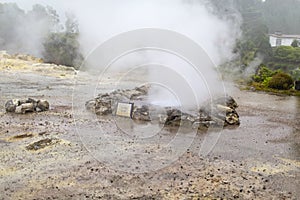 Gushing geyser during heavy rain