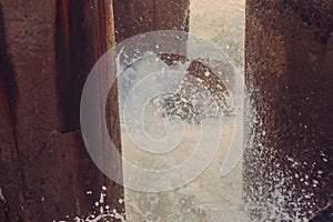 Gushing water waves in a beach