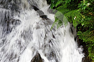 Gushing waterfall detail, wild water motion blur