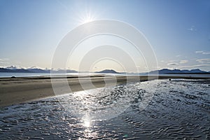 Gustavus beach with sunburst