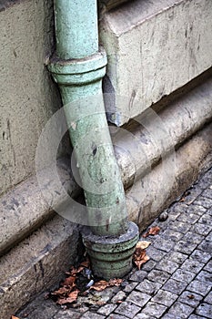 Gutter downpipe on a old wall
