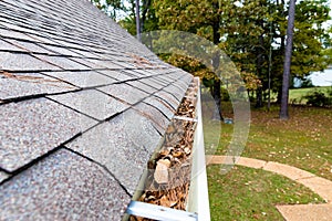 Gutter on home full of leaves and pinestraw