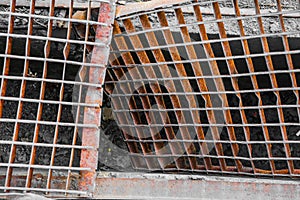 Gutter rusty broken metal grille