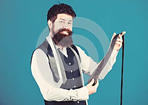 Guy with beard choosing necktie. Perfect necktie. For formal occasions choose solid colored tie that is darker than your