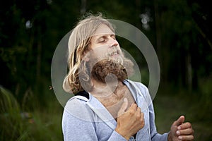A guy with a big white beard. A man with long hair. A traveler seeking spiritual insight.