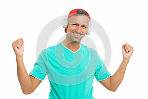 Guy in cap listen music stereo headphones. Good mood. Modern wireless headphones. Perfect sound concept. Electronic