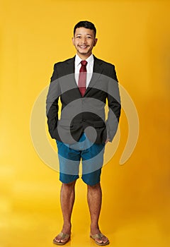 Guy with coat and beach shorts