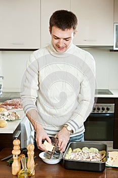 Guy cooking french-style veal in pan