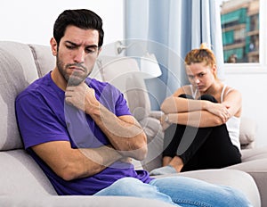 Guy on couch after discord with girlfriend