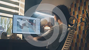 Guy creating 3D prototype of guitar