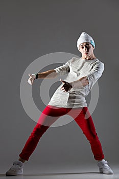 Guy dancing in beanie