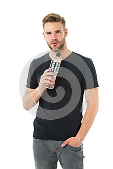 Guy drink water on white background. Man care health and water balance. Sportsman care hydration water nourishment body