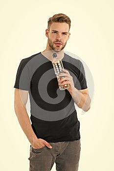Guy drink water on white background. Man care health and water balance. Sportsman care hydration water nourishment body