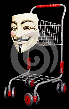 Guy fawkes mask with a shopping trolley
