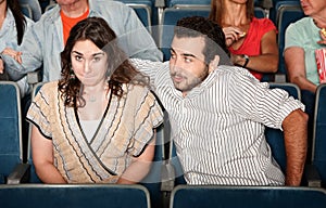 Guy Flirting in Theater